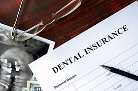 Dental insurance paperwork for the cost of dental implants in Hamden