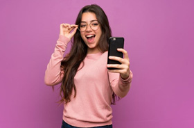 Confident teen girl taking a selfie